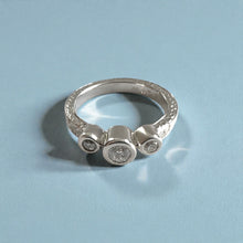 Load image into Gallery viewer, Palau 3mm Old English Flat Ring with Bezel Set Diamonds in 14K White Gold in size 5 1/4 with chip chop side engraving