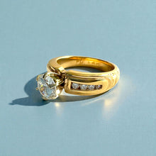 Load image into Gallery viewer, Kaimana Tapered 6mm Old English Ring with 6.4mm Cubic Zirconia & Diamonds in 14K Yellow Gold in size 7 1/8