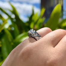 Load image into Gallery viewer, Model wearing Old English & Hibiscus 6mm French Mount Solitaire Ring in .75ct Cubic Zirconia in 14K White Gold in size 6 5/8