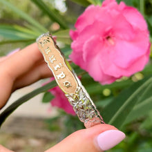 Load image into Gallery viewer, Two-Tone Deep Cut Maile 10mm Hawaiian Bangle in 14K Yellow and White Gold