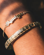 Load image into Gallery viewer, Two Hawaiian bracelets on woman's hand