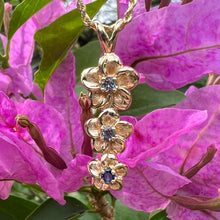 Load image into Gallery viewer, Three Vertical Plumeria Pendant with Blue Sapphire and two Alexandrites in 14K Yellow Gold
