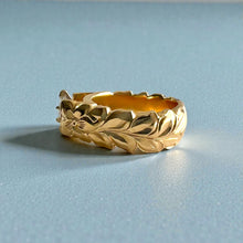 Load image into Gallery viewer, Scalloped Shiny Maile &amp; Hibiscus 8mm French Mount Solitaire Ring with .81ct Marquise Cubic Zirconia in 14K Yellow Gold in size 6 3/4
