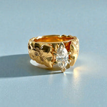 Load image into Gallery viewer, Scalloped Shiny Maile &amp; Hibiscus 8mm French Mount Solitaire Ring with .81ct Marquise Cubic Zirconia in 14K Yellow Gold in size 6 3/4
