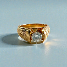 Load image into Gallery viewer, Old English &amp; Hibiscus 8mm Tapered French Mount Solitaire Ring with 5.4mm Cubic Zirconia in 14K Yellow Gold in size 8 1/8
