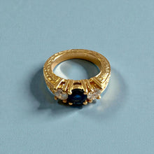 Load image into Gallery viewer, Malama Tapered Flat Ring with Blue Sapphire and Diamonds in 14K Yellow Gold in size 5
