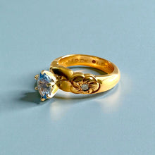 Load image into Gallery viewer, Palau Plumeria Ring with Light Blue Sapphire &amp; Diamonds in 14K Yellow Gold in size 6 1/8
