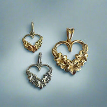 Load image into Gallery viewer, three plumeria heart pendants in small medium and large
