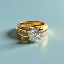 Load image into Gallery viewer, Kaimana Tapered 6mm Plumeria with Leaves Ring with 6.4mm Cubic Zirconia &amp; Diamonds in 14K Yellow Gold in size 6 1/2
