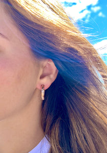 Model wearing 4mm Old English Medium Hoop Earrings with Post in 14K Pink Gold