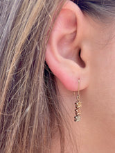 Load image into Gallery viewer, Model wearing Tri-Color Three Baby Plumerias Dangle Earrings in 14K Gold
