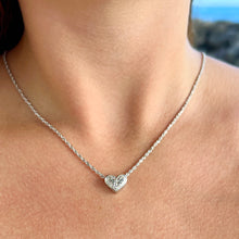 Load image into Gallery viewer, Model wearing small Slider Heart Pendant with Hibiscus &amp; Leaves in 14K White Gold
