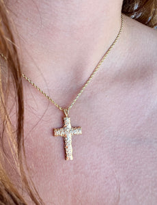 model wearing Scalloped Hibiscus 6mm Cross Pendant in 14K Yellow Gold