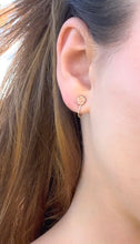 Load image into Gallery viewer, model wearing non-pierced Baby Hibiscus Screw Back Earrings in 14K Gold
